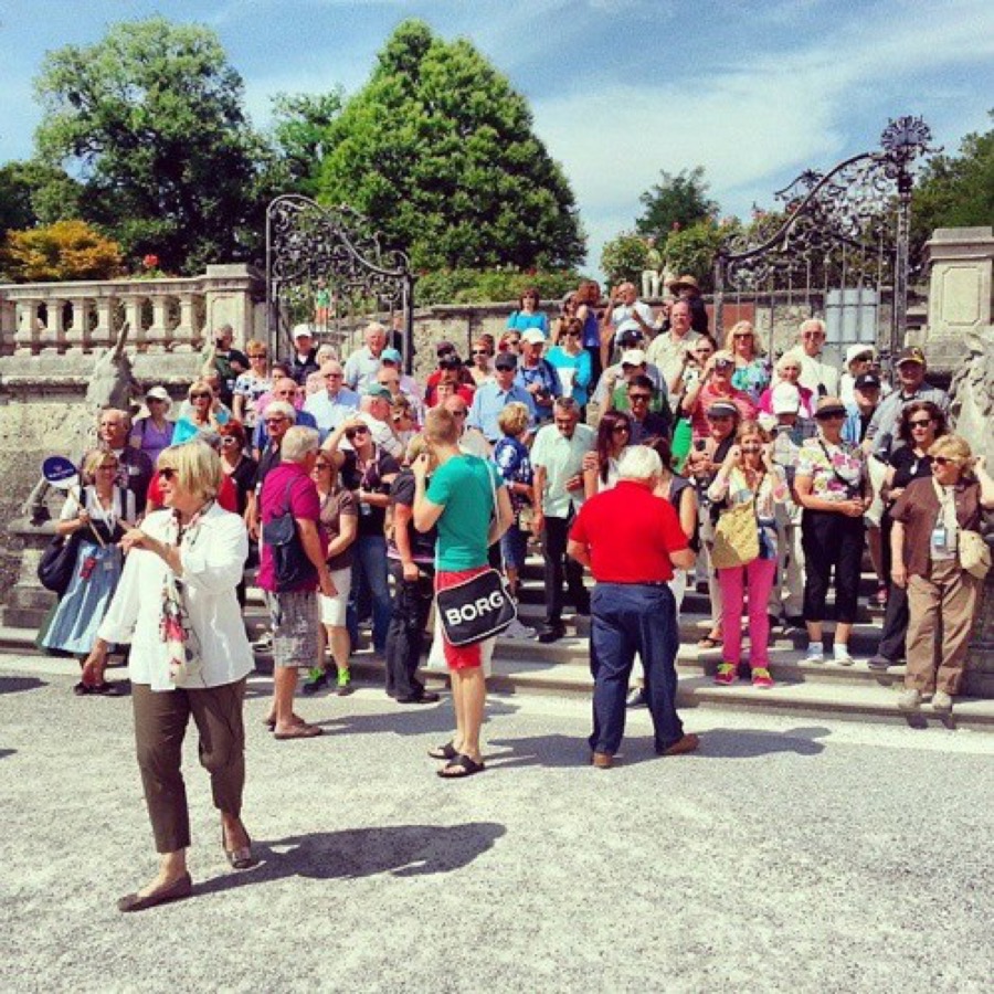 Visitors at the gates of Mirabell Gardens in Salzburg
